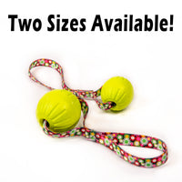 Virtually Indestructible Foam Fetch Dog Ball with Heavy-Duty Tug Handle - Medium 12"x2.75" Neon Flowers