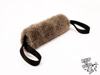 Sturdy Sheepskin Dog Tug with Handles and Replaceable Squeaker Pocket - Interactive Training & Motivation Toy